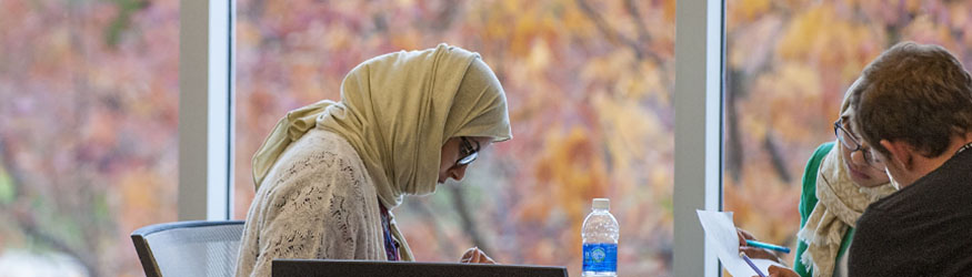 photo of three students studying