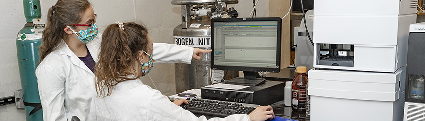 photo of a professor and student in a lab