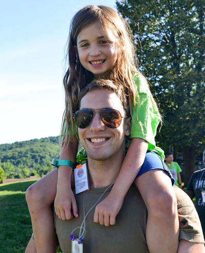 Image of Kovac with Camp Love participant