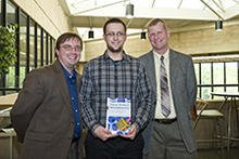 photo of Zach Gault with Dr. Deibel, his advisor and Dean Voss